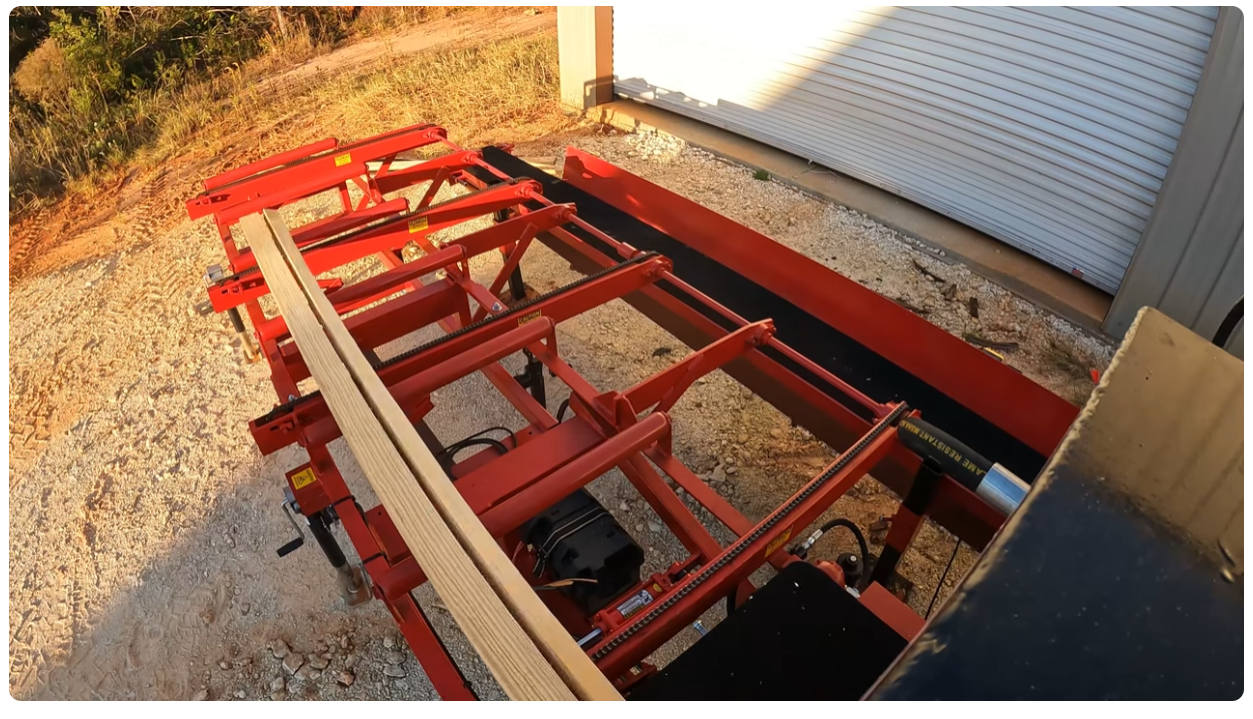 Board edger operator using Cook’s Transfer Deck system to return trimmed boards efficiently to the front of the edger. Demonstrates smooth board flow, reduced manual handling, and how one worker can boost sawmill production using Cook’s automated equipment.
